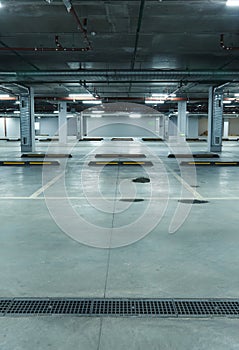 Vertical image of empty underground parking lot