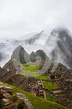 Vertical image of Machu Picchu lost city, Peru.