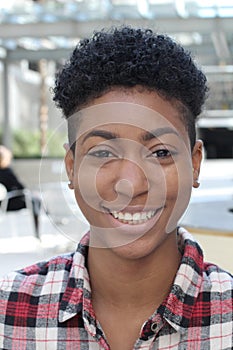 Vertical image of pretty african american college student on campus