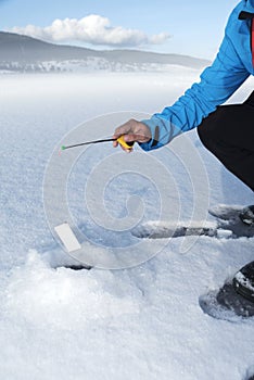 Vertical image on a snow Conceptual photography Internet phishing Financial fraud