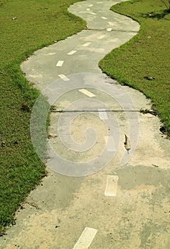 Vertical image of the winding path in the public park