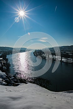 Vertical image of winter ladscape, scenic view overlooking river Moldau in Prague
