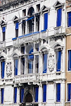 Vertical: Intricate art and sculptures adorn the historic buildings in Venice, Italy.