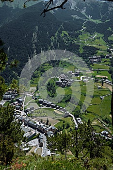 vertical landscape and cityscape from the Roc Del Quer viewpoint in the Andorran Pyrenees