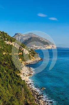 Vertical landscape view of the rugged mountainous green east coast of Sardinia