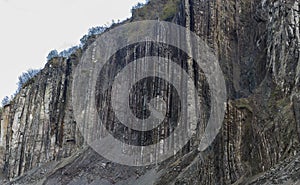 Vertical layers of rock in the mountains