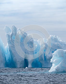 Vertical Light to Dark Blue Iceberg with Windows