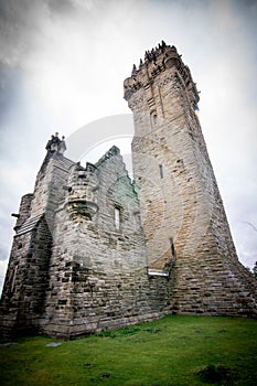 Vertical low angle shot of the beautiful The National Wallace Monument captured in Stirling, UK