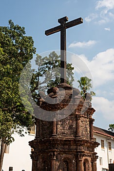 Vertical low angle shot of a cross in  the Old Goa Panaji in India