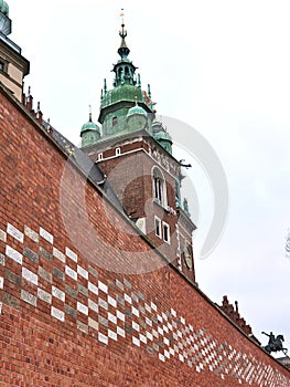 Vertical low angle shot of the famous Wawel Royal Castle Krakow, Poland