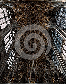 Vertical low angle shot of the Gloucester Cathedral Cloisters with gothic architecture,  England