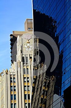 Vertical low angle shot of high rise buildings with mirror windows in New York, USA