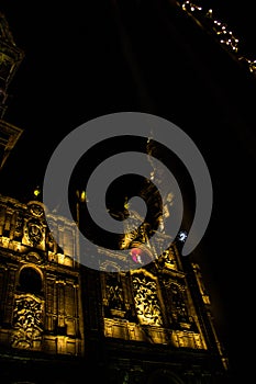 Vertical low angle shot of the lit Morelia cathedral at night