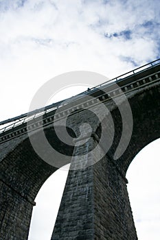 Vertical low angle shot of Menai Suspension Bridge, Bangor, North Wales, UK
