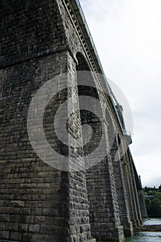 Vertical low angle shot of Menai Suspension Bridge, Bangor, North Wales, UK