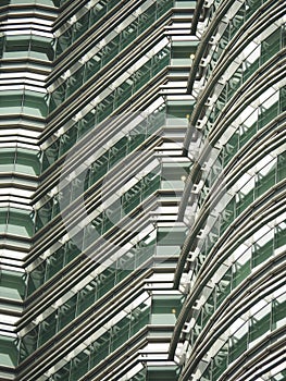 Vertical low angle shot of a skyscraper during midday