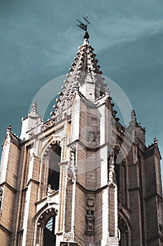 Vertical low-angle view of Catedral de Leon under the blue sky photo