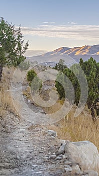 Vertical Meandering dirt hiking trail above the Utah Valley