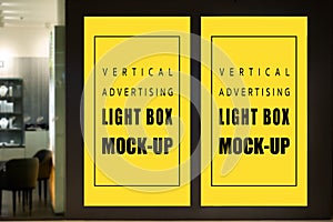 Vertical mock up light box at front of jewellery store