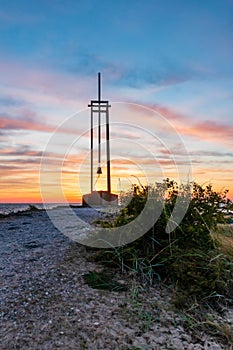 Vertical, monument, bush and sundown