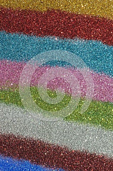 Vertical Multicolored Glitter Background. Coloured Stripes of Glitter