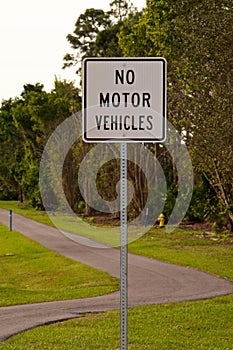 Vertical no motor vehicles sign