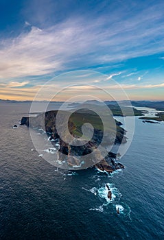 Vertical panorama landscape of the Bray Head cliffs on Valentia Island at sunset