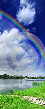 Vertical panorama with rainbow
