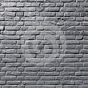 Square part of grey painted brick wall