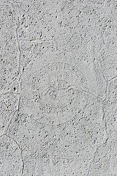 Vertical photo of the grey concrete wall texture