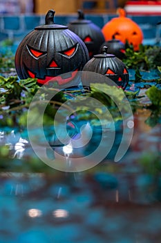 Vertical photo of Halloween ornament black color jack o lantern