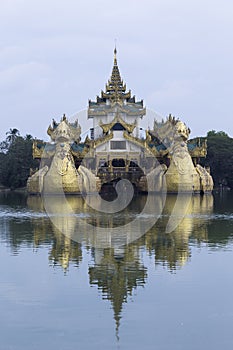 Vertical photo of the Karaweik Palace or royal barge replica