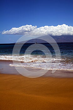 Vertical photo Maui Hawaii with clouds and beach front