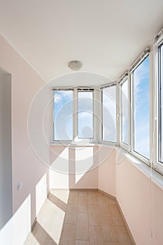 Vertical photo of new empty modern bright lodge or balcony with