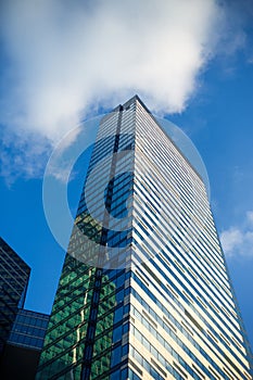 Rectangular skyscraper with a white glass facade