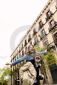 Vertical photo of senior married couple having fun together enjoying vacation