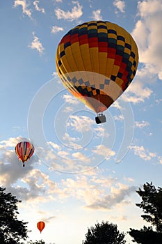 Vertical photograph three hot air balloons