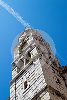 Vertical picture of the Bell Tower of St. Elias` Church or Church of St. Elias in the old town of Zadar, Croatia, with a vapur
