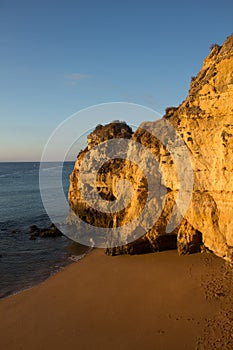 Vertical picture of a rock on the Algarve beach, Portugal