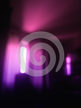 Vertical pink ray of light window bokeh background