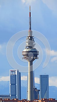 Vertical of the Piruli TV communications tower captured against a clear sky in Madrid photo
