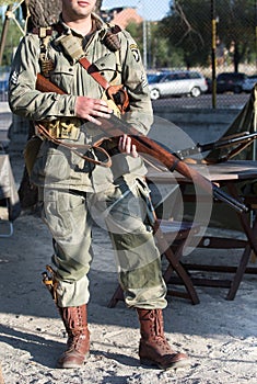 Vertical portrait of military 101st airborne division with rifle