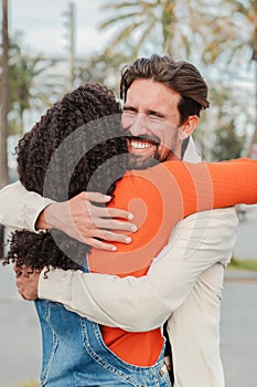 Vertical portrait. Passionate encounter of a couple in love embraced and tender hug, enjoying with happiness and emotion