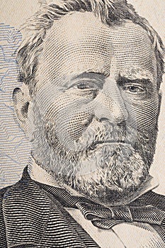 Vertical portrait of Ulysses Grant`s face on the US 50 dollar bill. Macro shot