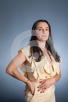 Vertical portrait of young businesswoman, lawyer, showing her business folder