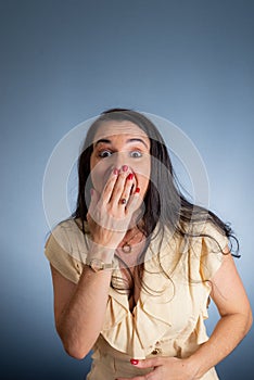 Vertical portrait of young businesswoman, lawyer, showing her business folder