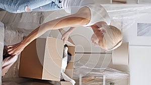 Vertical relocation stress annoyed woman packing