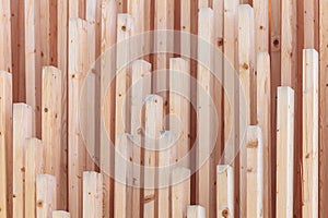Vertical row of new wooden planks photo