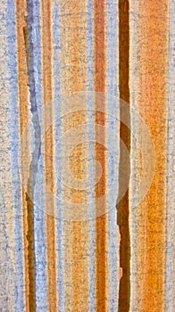 Vertical Rust Stripes on Metal Background