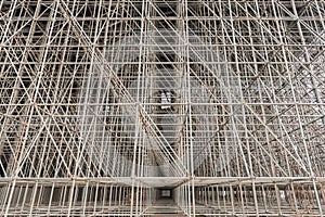 Vertical scaffolding formed a myriad of grid